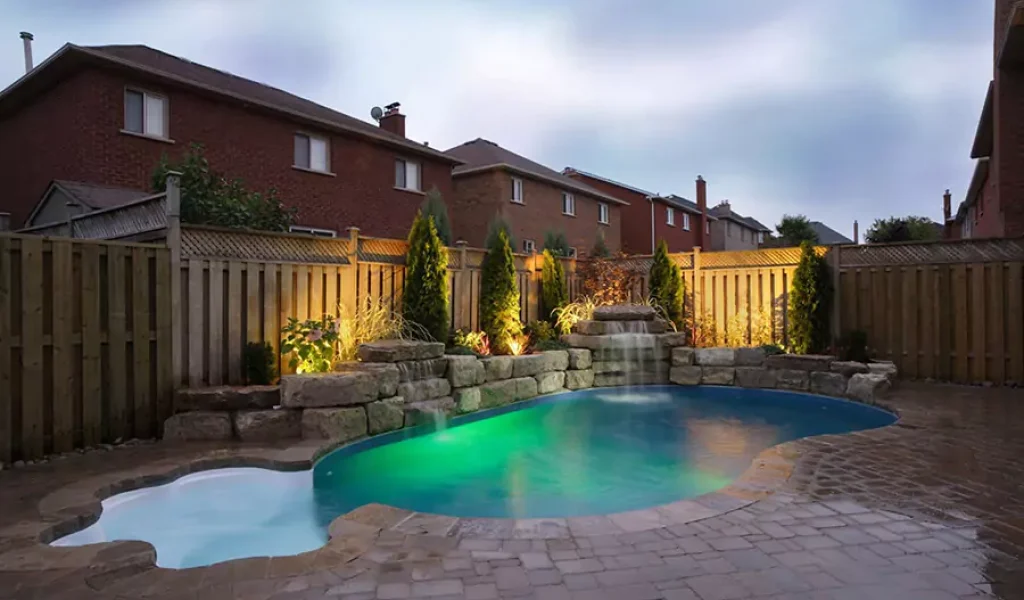 backyard lighting and a Swimming pool with houses