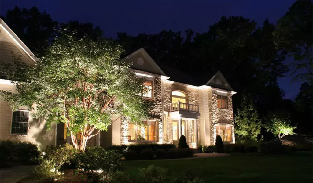 In front of a house installed well decorated outdoor lighting
